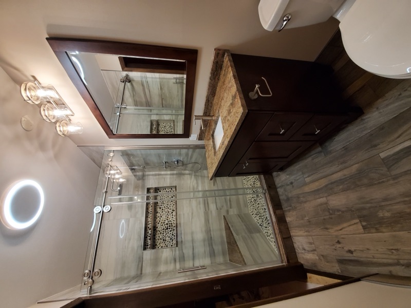 Powder room with custom vanity and finishes