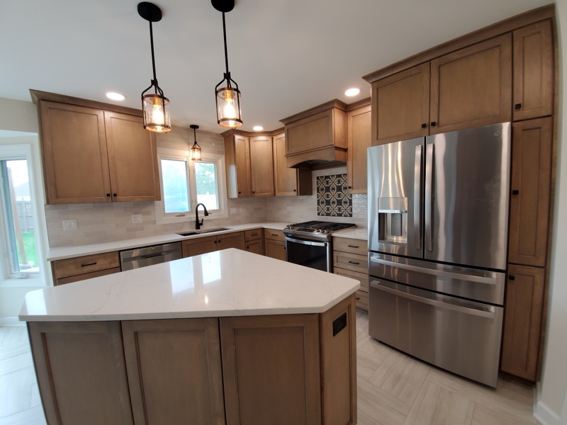 Open-concept kitchen renovation by Alpha Development Group